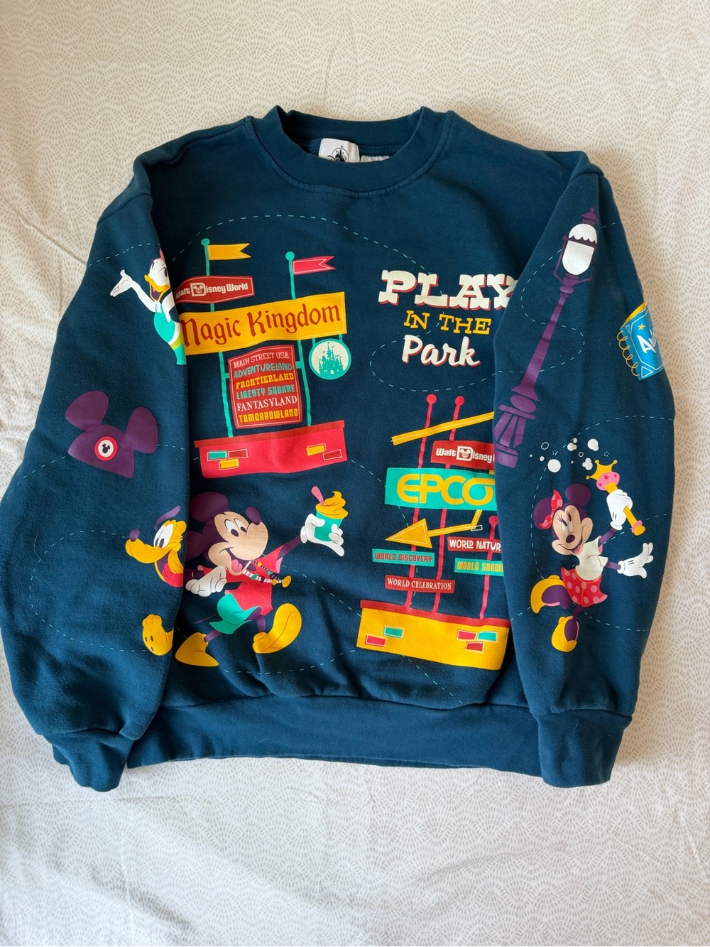 Disney Navy Crewneck Sweatshirt with Multi-Color Park Graphics